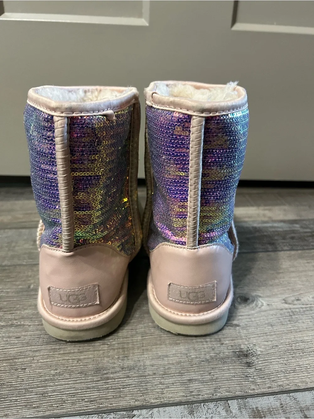 UGG Classic Short Cosmos Sequin Boots in the color quartz pink purple